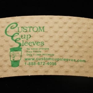 Custom coffee cup sleeve on natural with green text - Custom Cup Sleeves Smyrna, TN