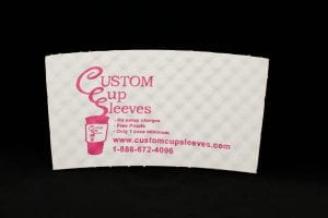 Custom coffee cup sleeve in white with pink text - Custom Cup Sleeves Smyrna, TN