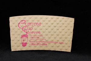 Custom coffee cup sleeve in natural with pink text - Custom Cup Sleeves Smyrna, TN